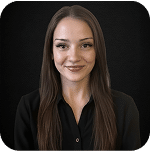 Maddie Spencer-Garcia, team member at Prosperia Marketing, smiling in a professional black shirt against a dark background.